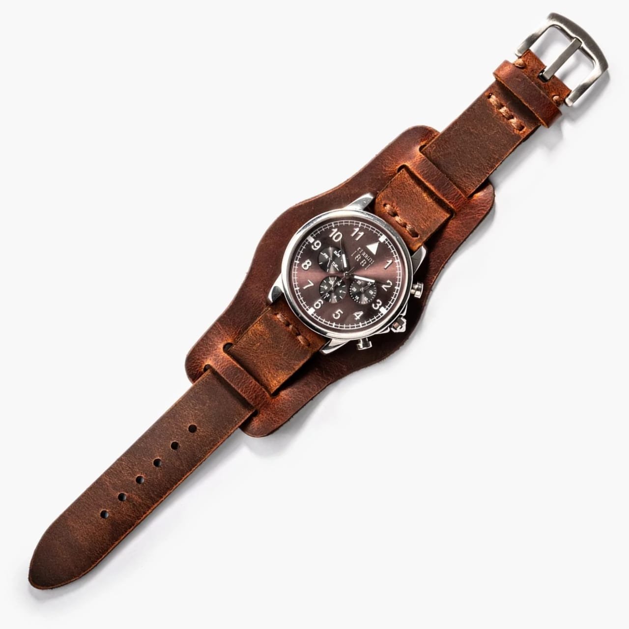 Bund Tek Katlı Deri Kayış – Oranj, masa üzerinde açık şekilde sergileniyor