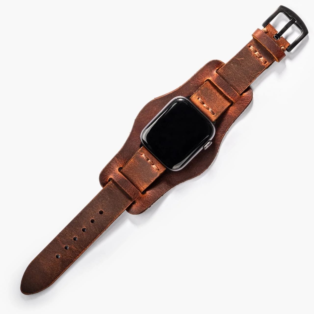 Bund Tek Katlı Apple Watch Deri Kayış – Oranj, masa üzerinde açık şekilde sergileniyor